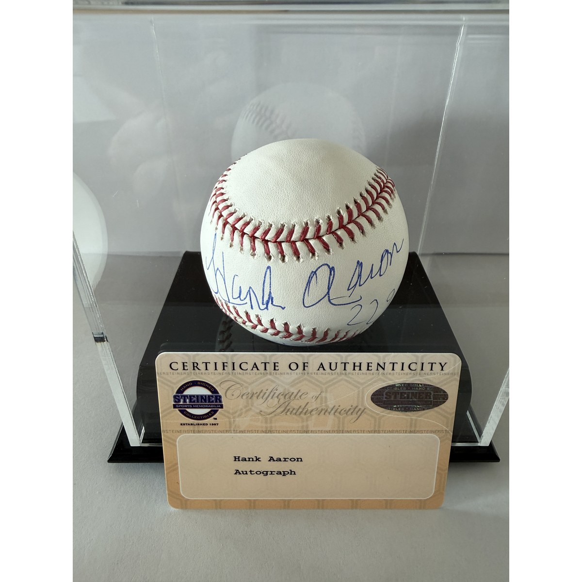 Hank Aaron baseball in box