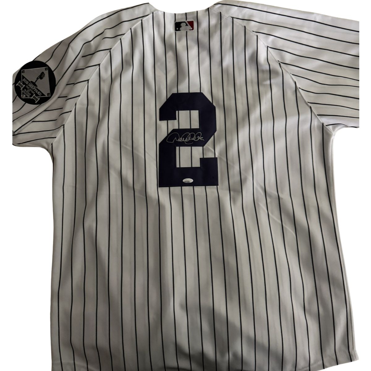 Derek Jeter signed Jersey with Bob Sheppard and George Steinbrenner patches